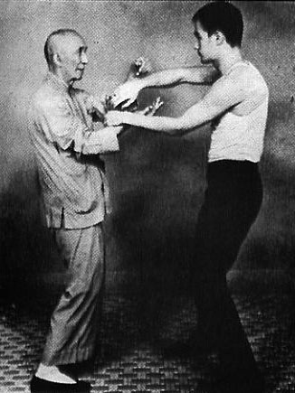 Old photo of Master Ip man training with Bruce Lee
